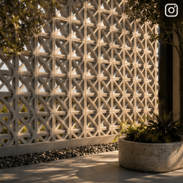 Architectural GRC jali installation with warm sunlight